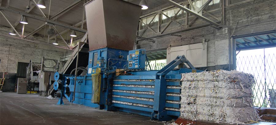 shredded paper being baled at Confidata's shredding facility