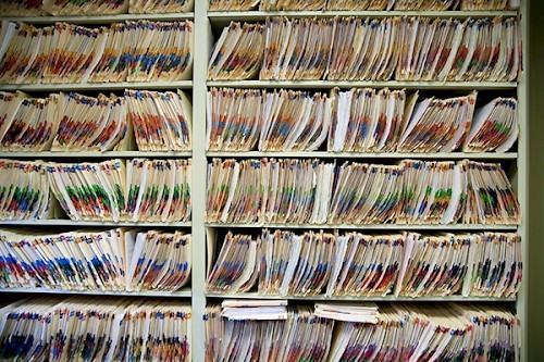 shelves filled with medical records containing personal data